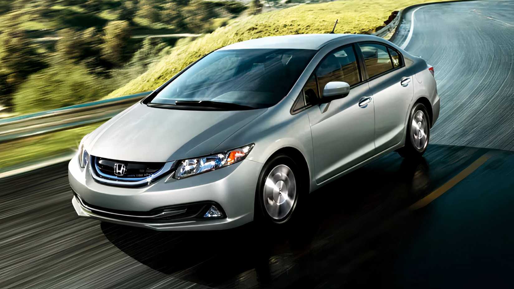 2015 Honda Civic Hybrid In silver front 3/4