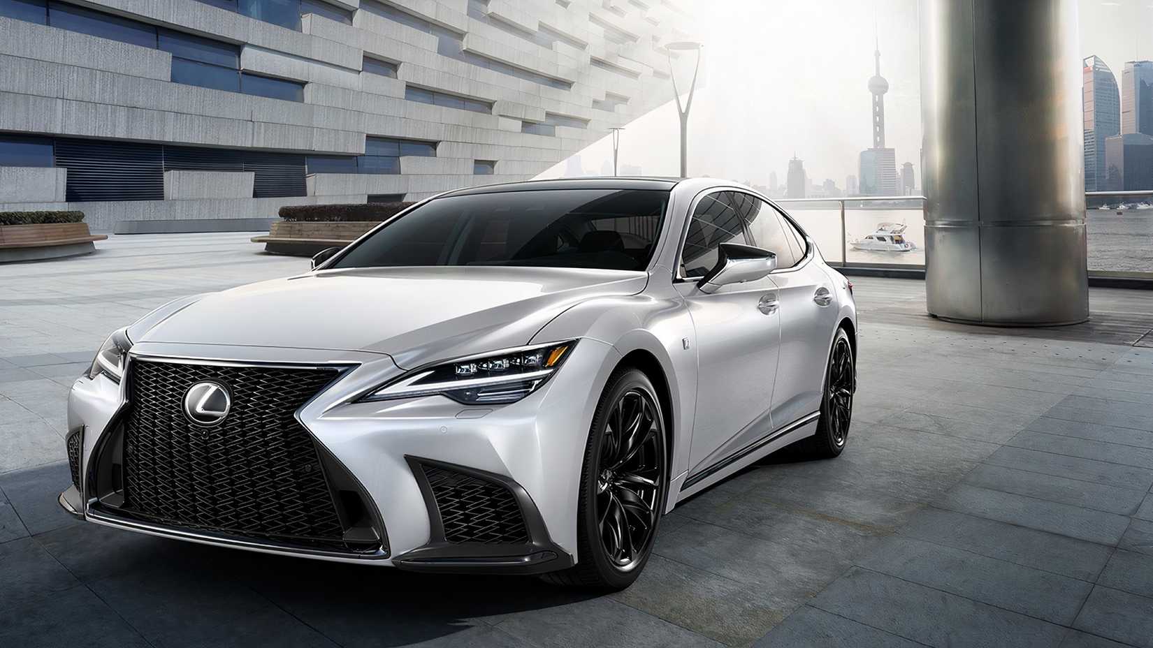 2024 Lexus LS 500 in white Posing in front of city scape