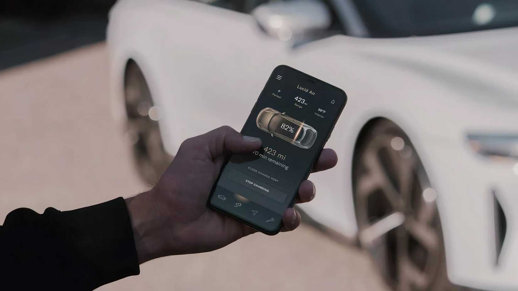 A 2025 Lucid Air's charging is being monitored via a mobile app. 