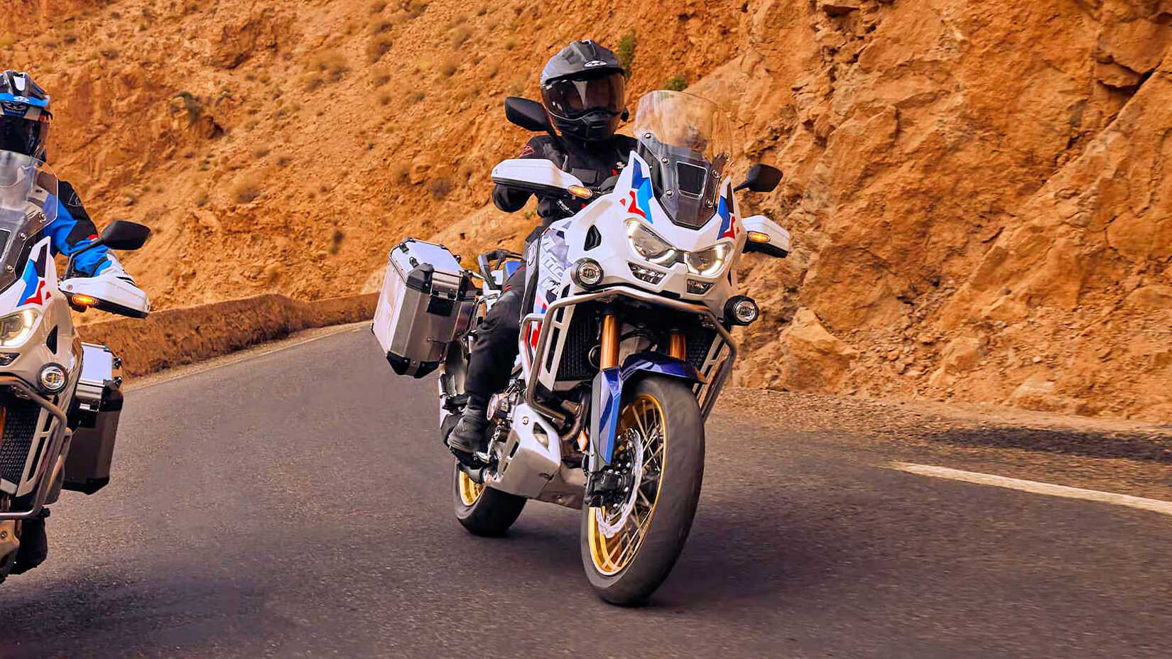 Rider on an accessorized 2024 Honda Africa Twin Adventure Sports ES