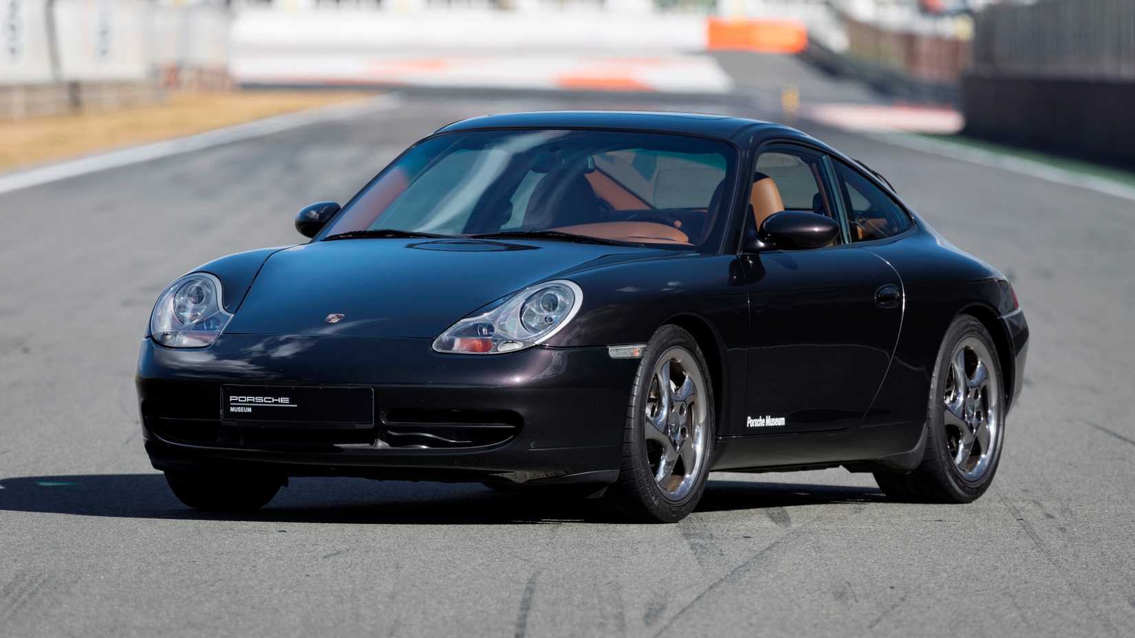 Black 996 Porsche 911 Carrera front-quarter