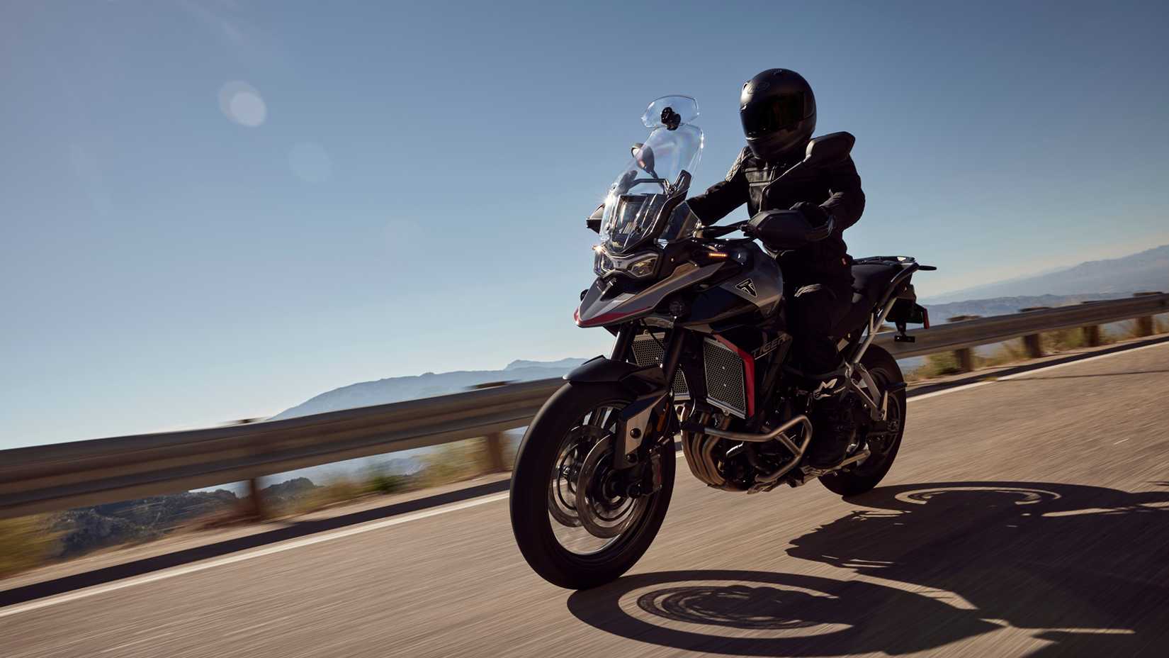 2025 Triumph Tiger GT Pro cruising front third quarter view