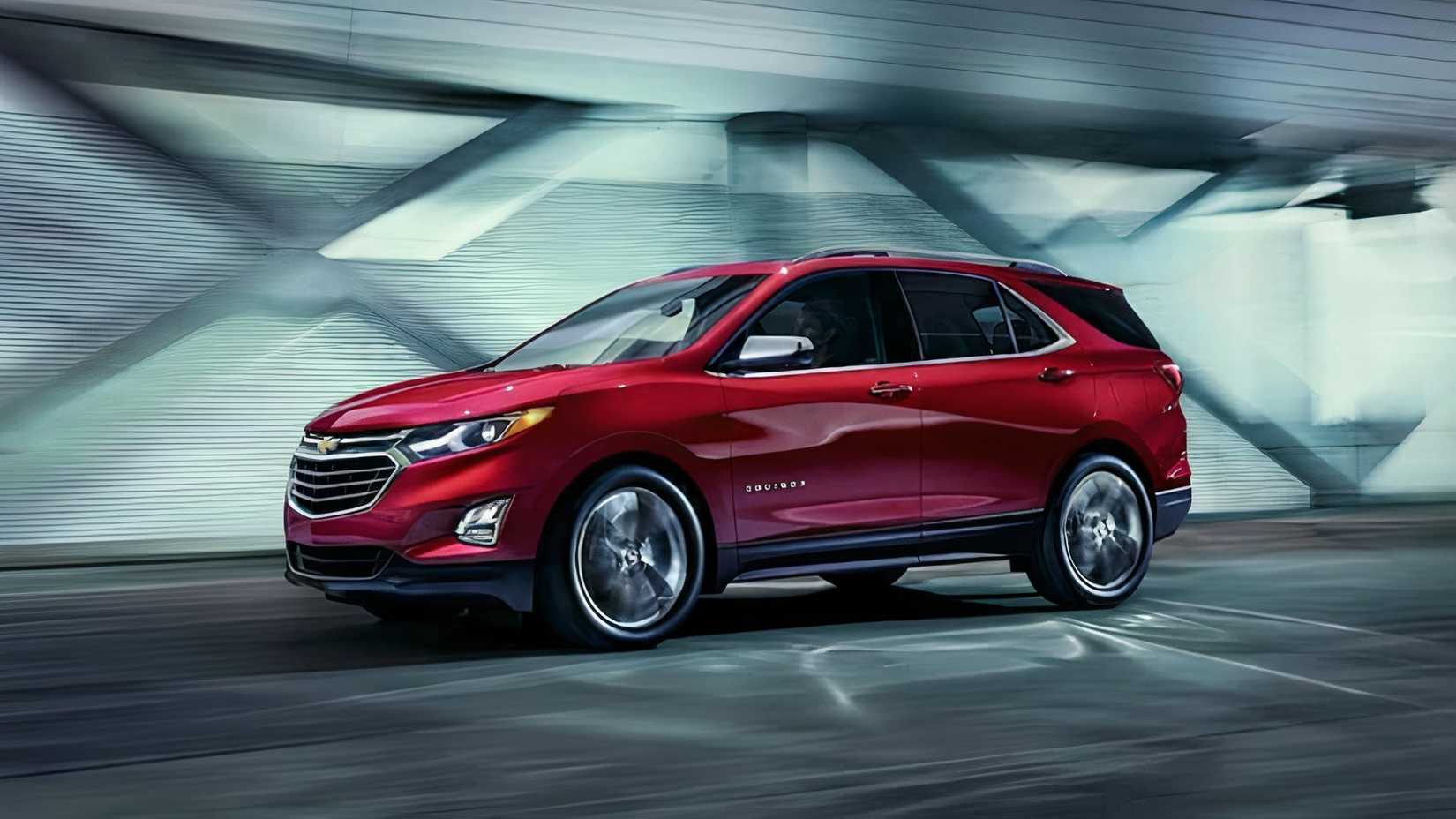 Foto lateral do Chevrolet Equinox 2019-2021 dirigindo na estrada