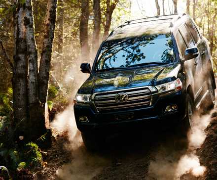 2020 Toyota Land Cruiser driving on a forest road