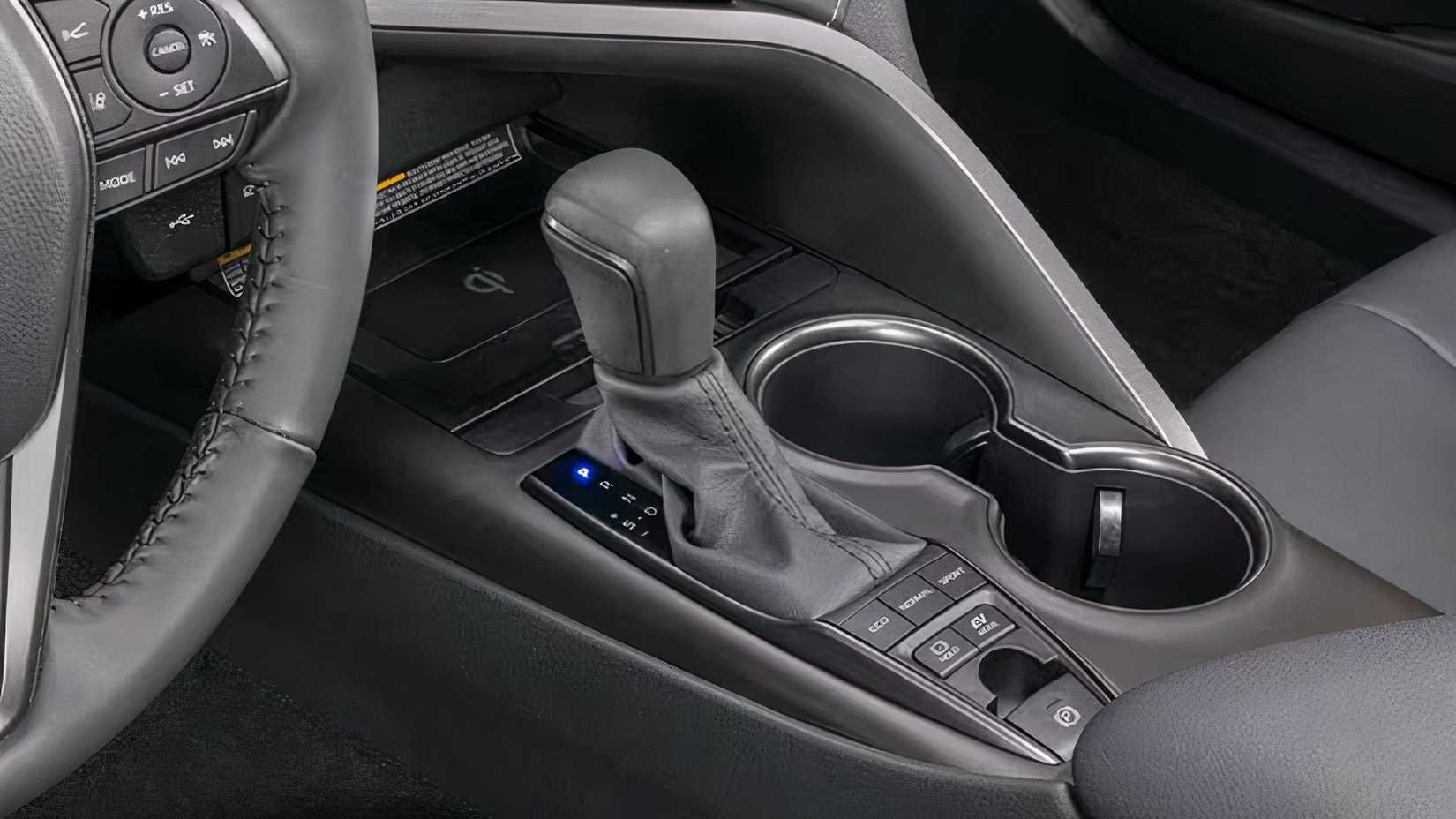 A close up of the automatic drive shifter of a 2023 Toyota Camry.