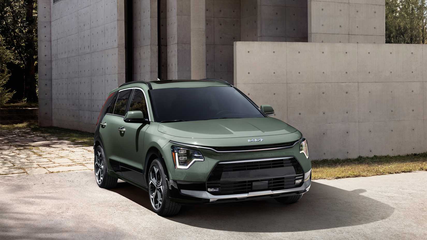 A Green 2024 Kia Niro Hybrid Parked