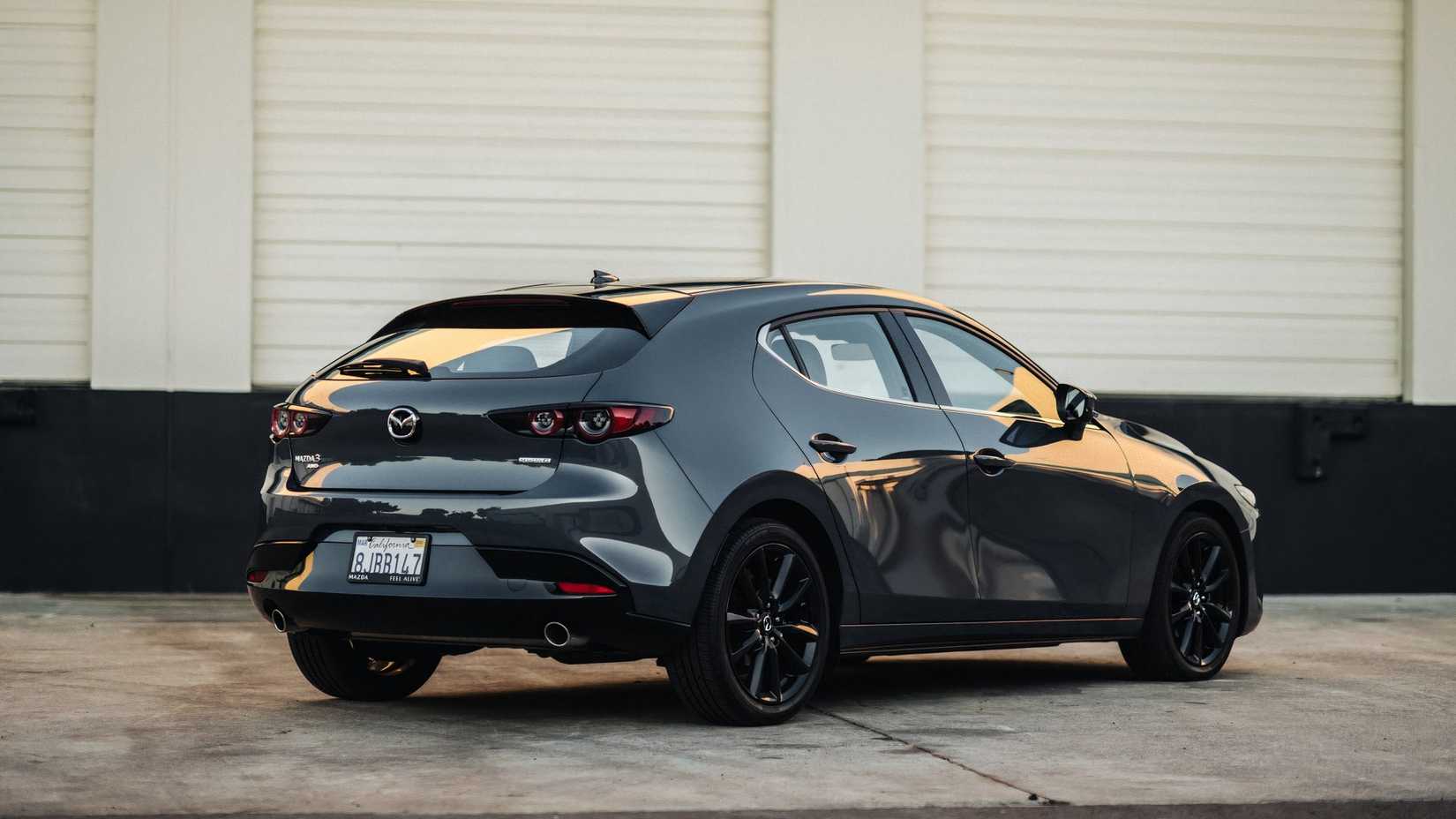 A rear three-quarter view of the 2024 Mazda3