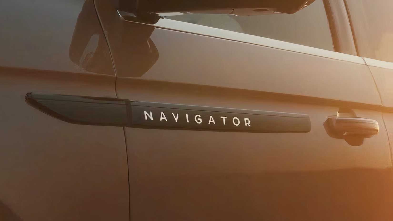 Close-up shot of the 'Navigator' badge on the front left door of the 2025 Lincoln Navigator