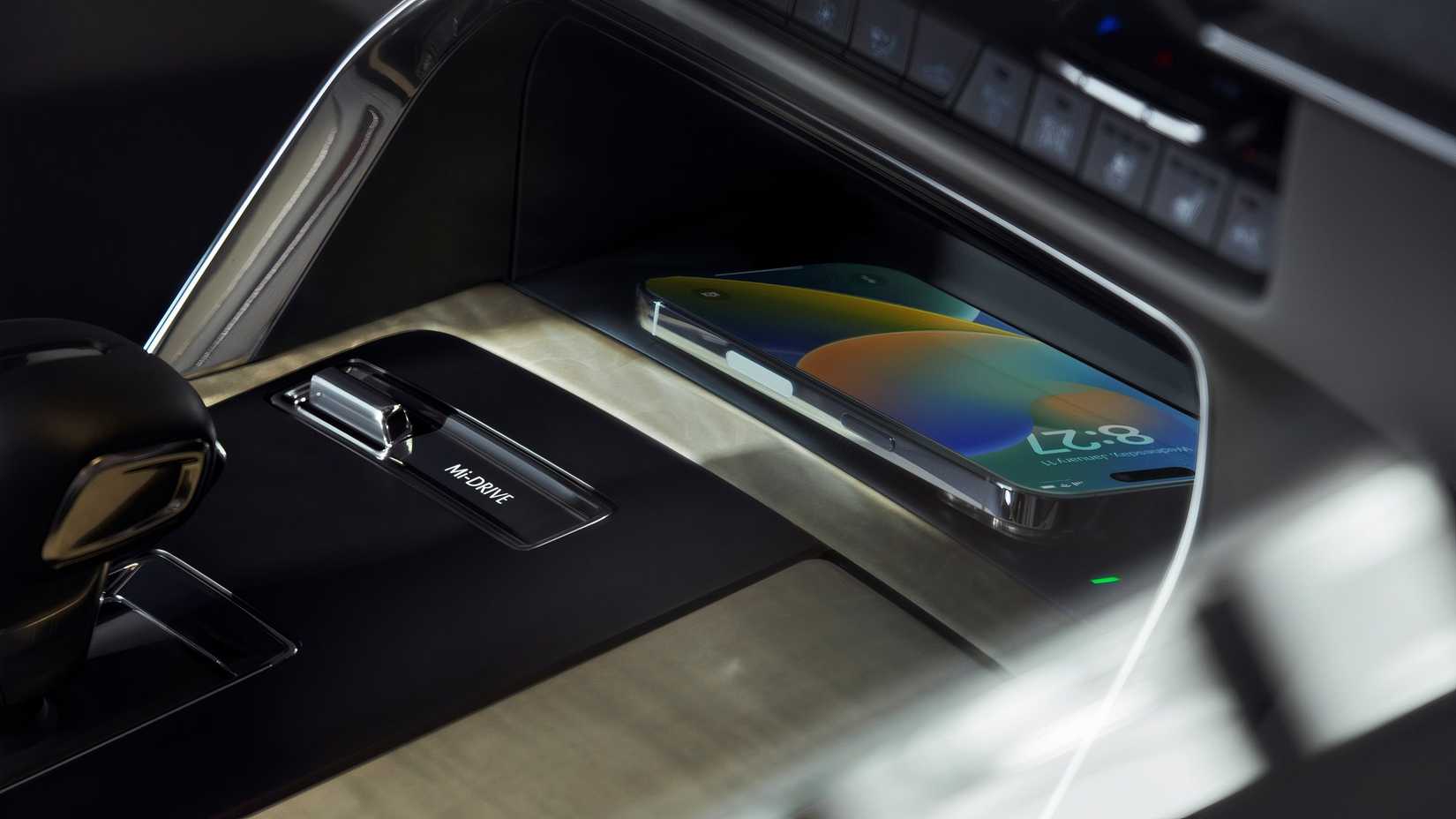 Interior shot of 2025 Mazda CX-90 wireless phone charging
