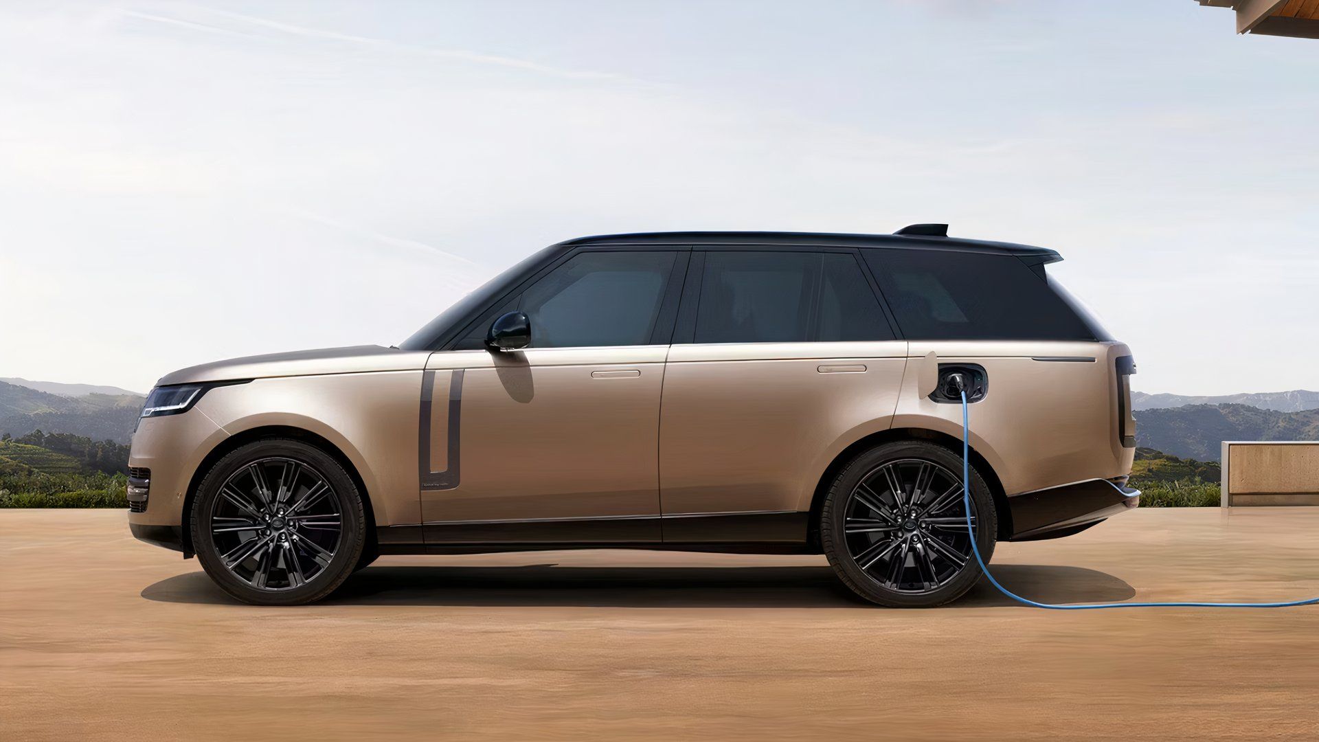 A Land Rover Range Rover PHEV is charging. 