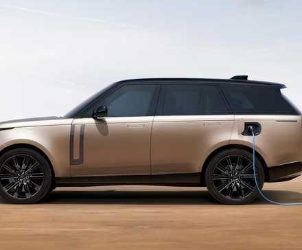 A Land Rover Range Rover PHEV is charging.
