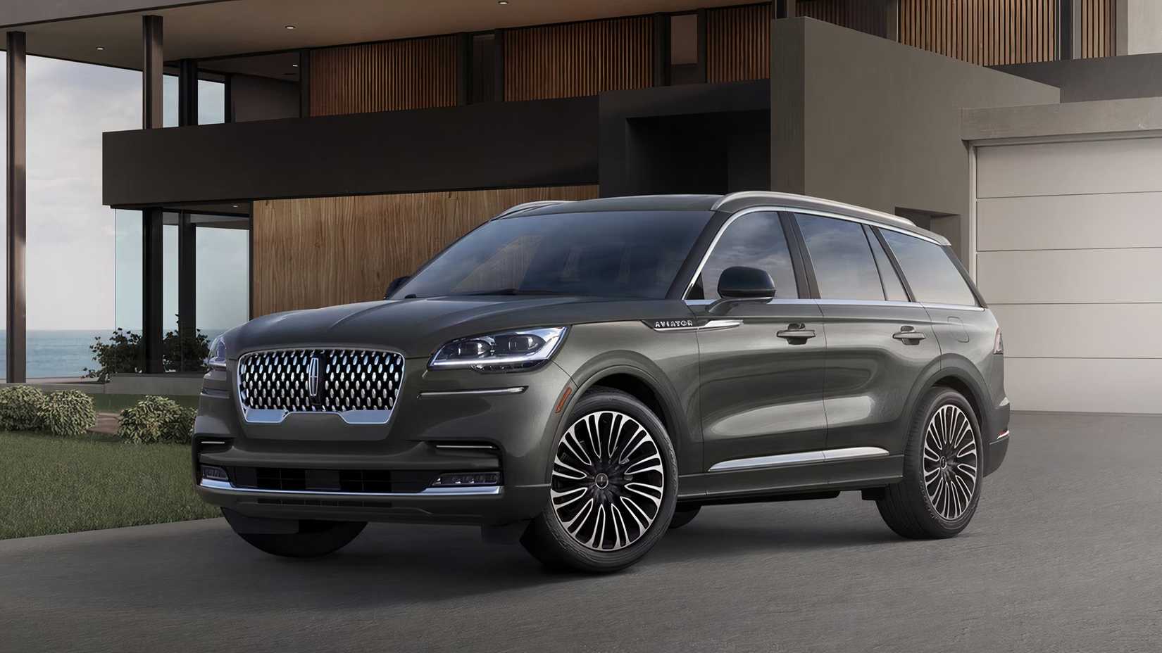 A Lincoln Aviator SUV is parked. 