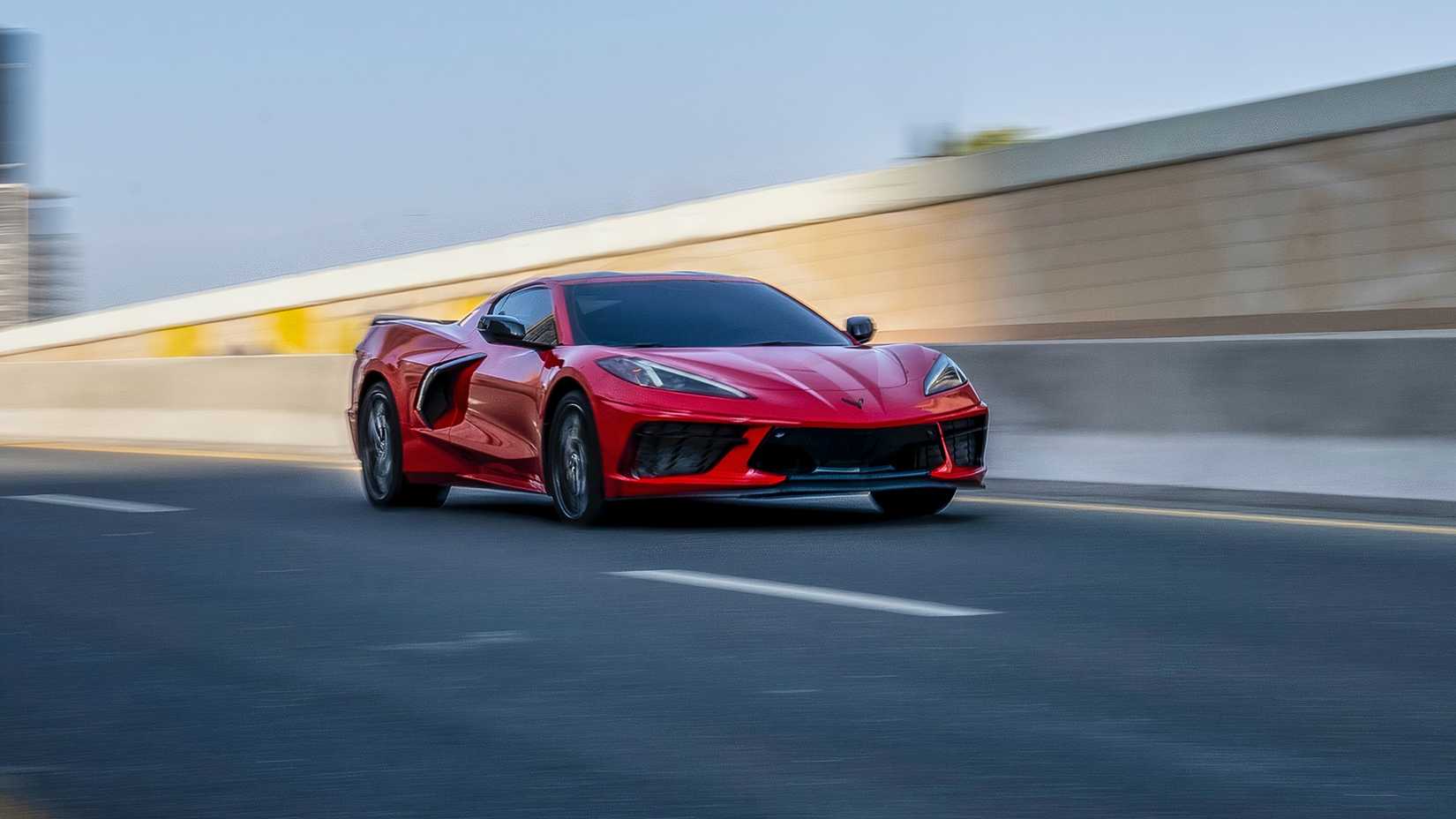 2024 Chevrolet Corvette in red being driven on road