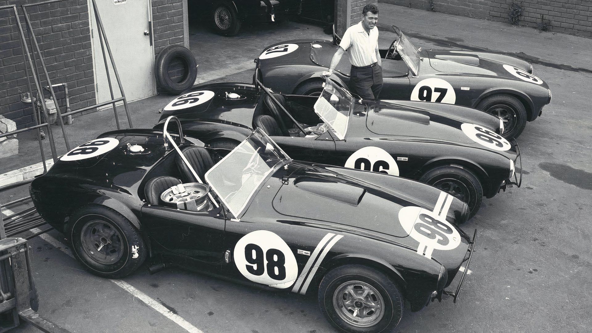 Top view of Carroll Shelby with three Cobras