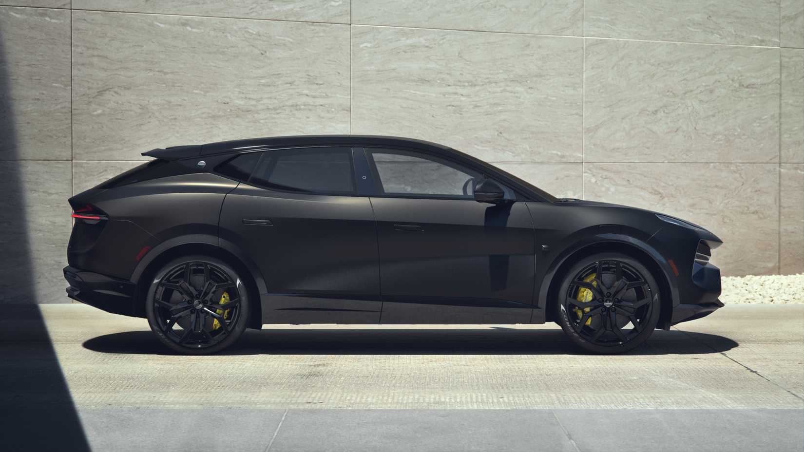 Side profile shot of a black Lotus Eletre Carbon