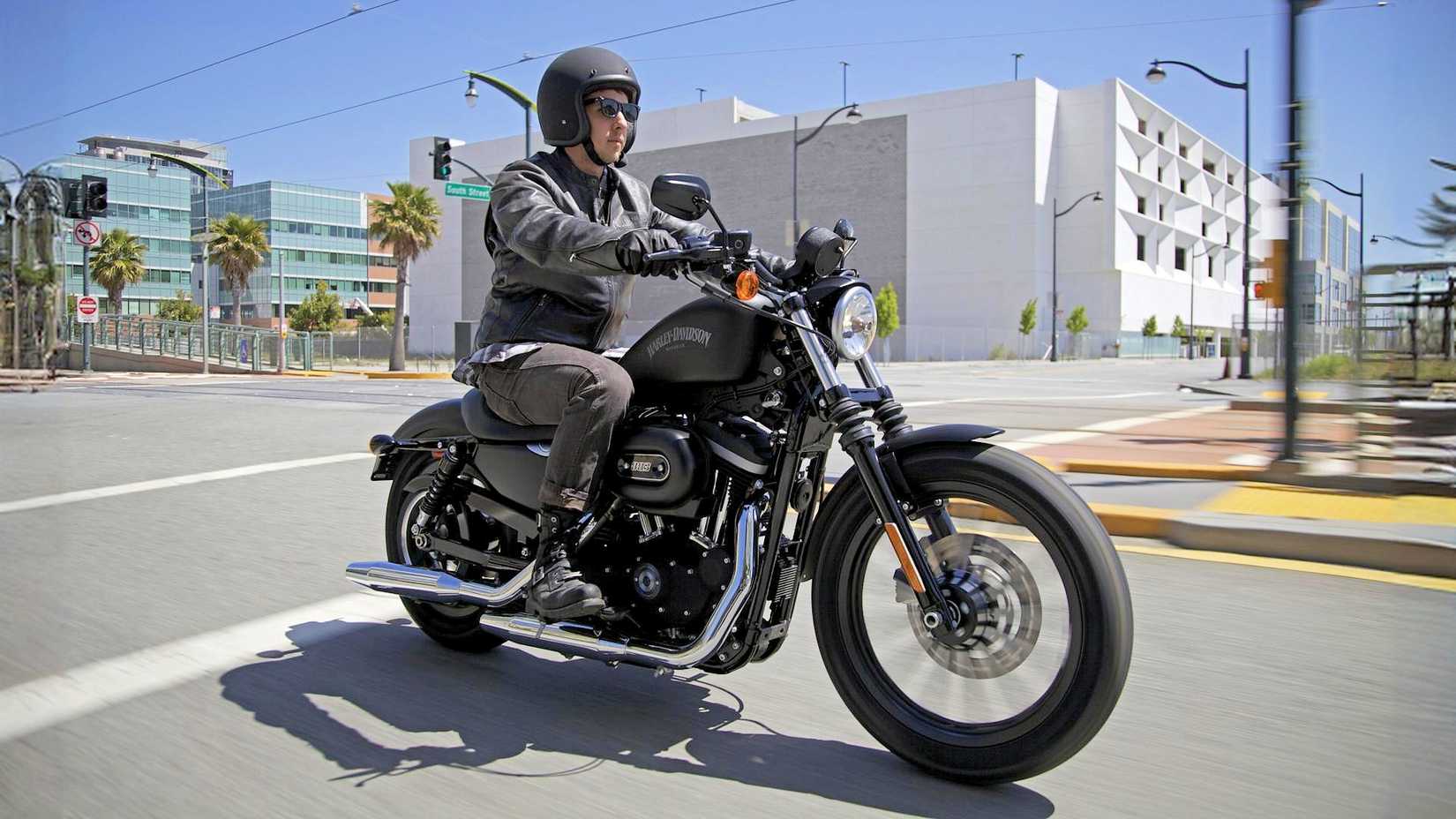 2013 Harley-Davidson Iron 883 cruising through town