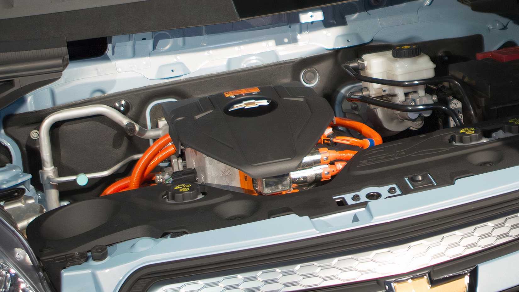 Underhood shot of a 2014 Chevrolet Spark EV, showing the electric motor