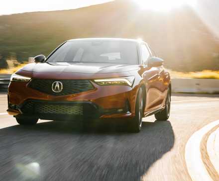 2023 Acura Integra driving on a winding road