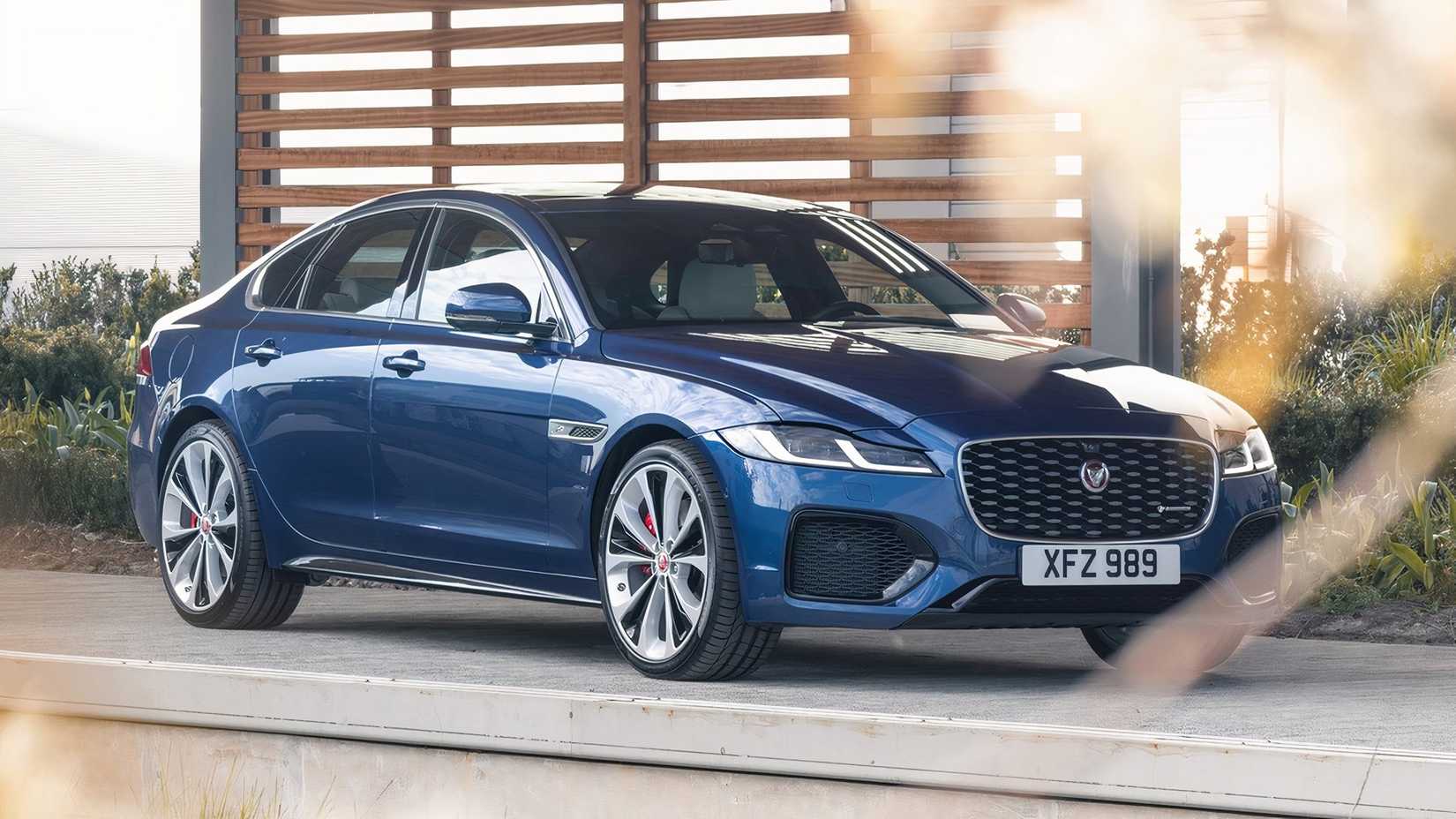2023 Jaguar XF front 3/4 shot parked in front of house