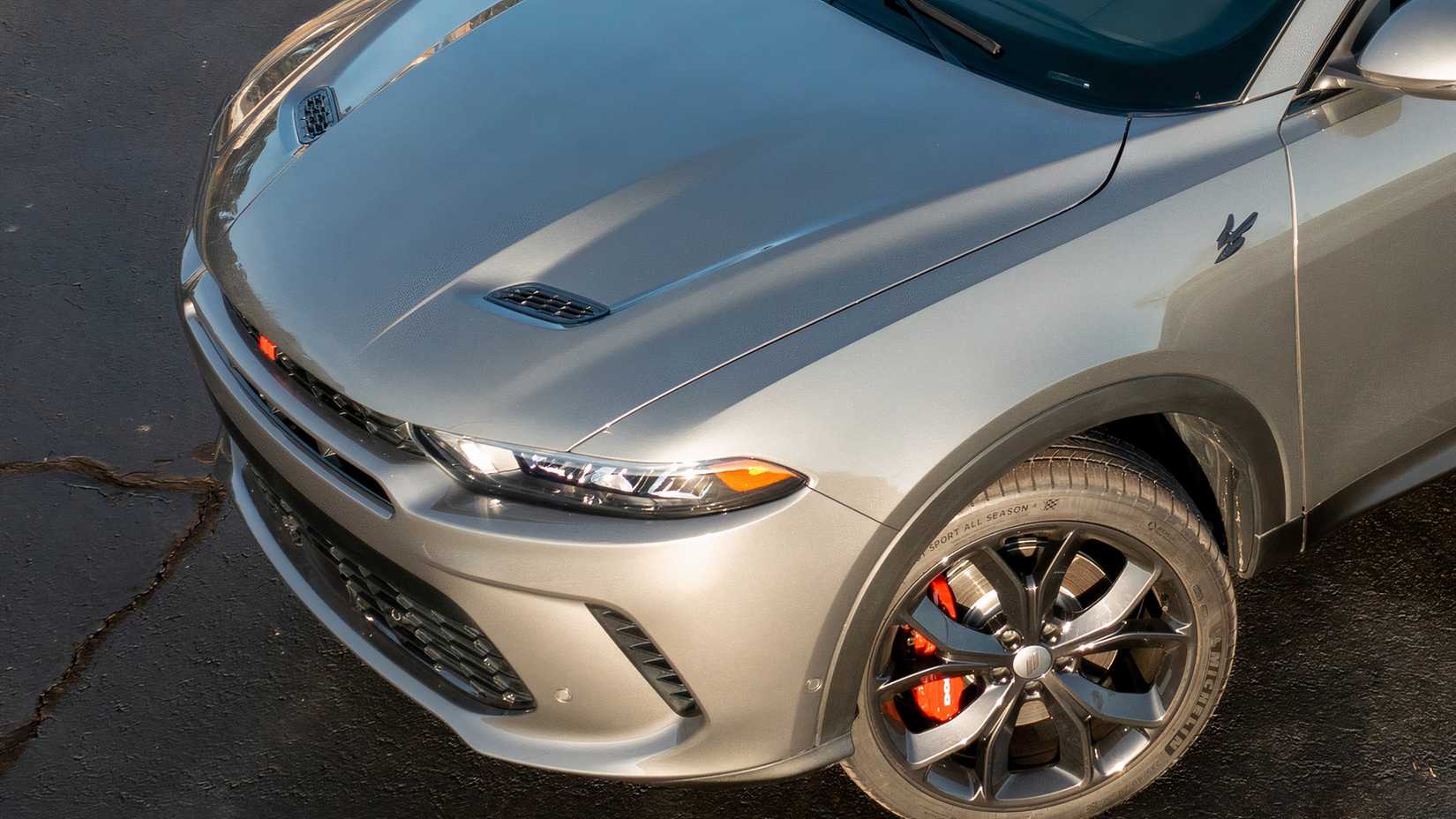 A detail shot of the 2024 Dodge Hornet GT's hood