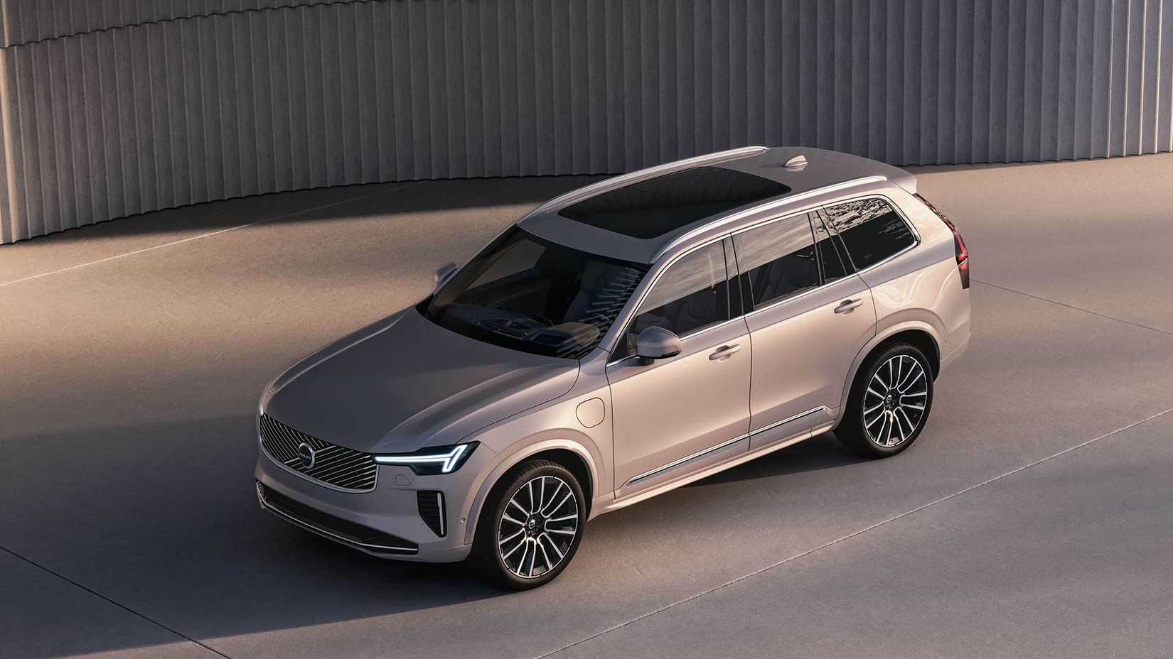 2025 Volvo XC90, front 3/4 view parked in studio