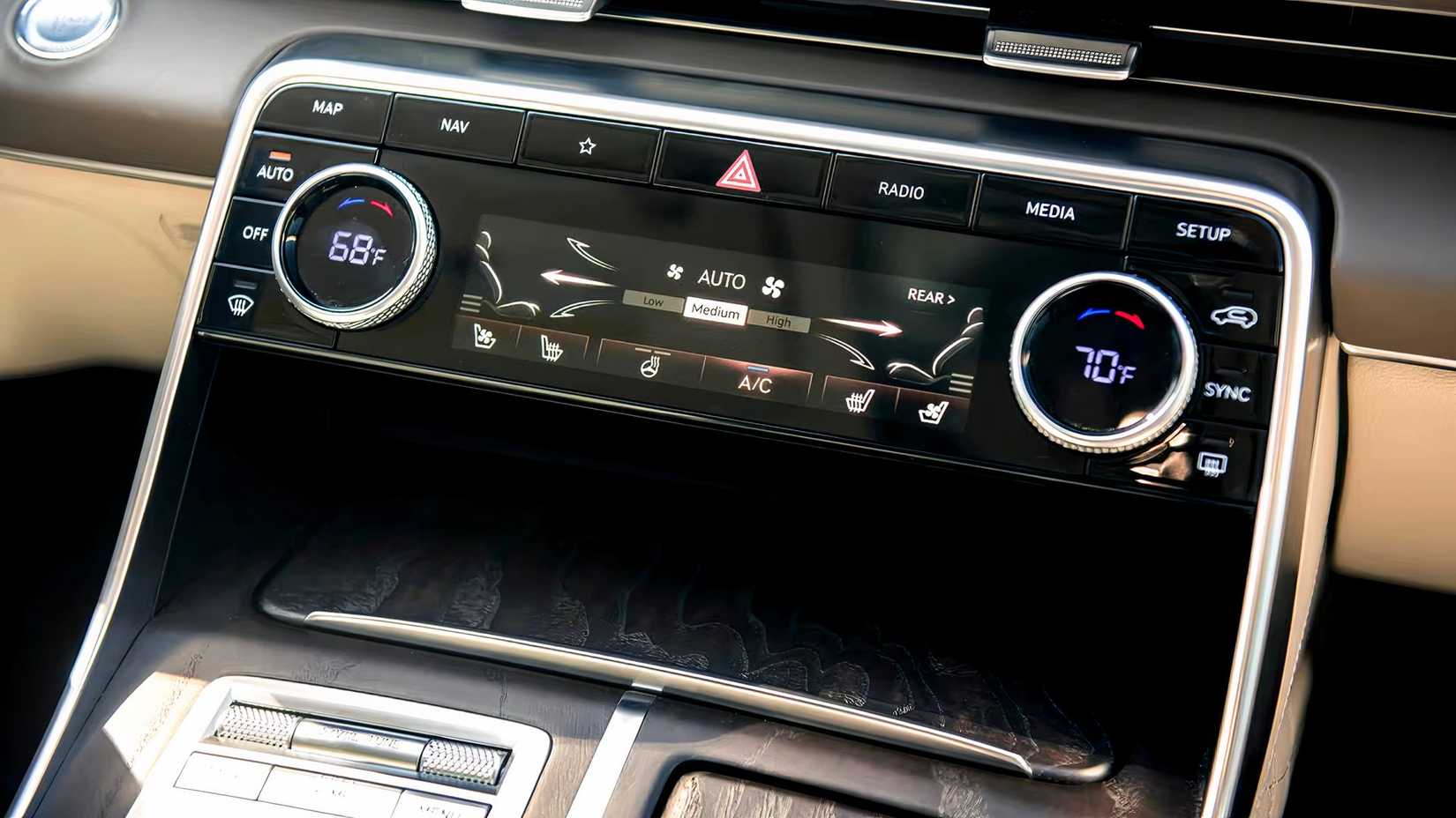 2024 Genesis GV80 interior showing central console and climate control