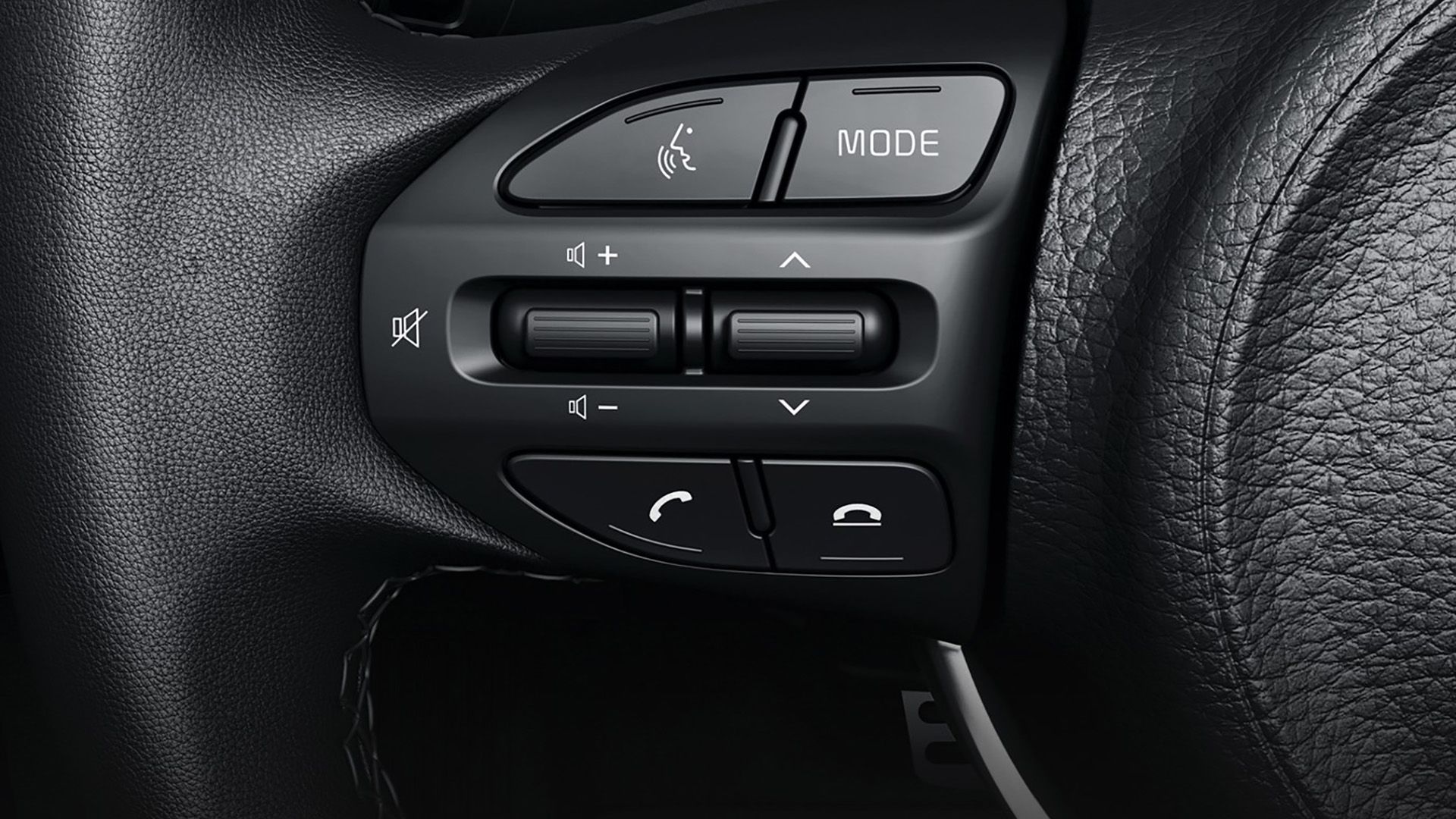 Funções integradas no volante de um Kia Rio 2023