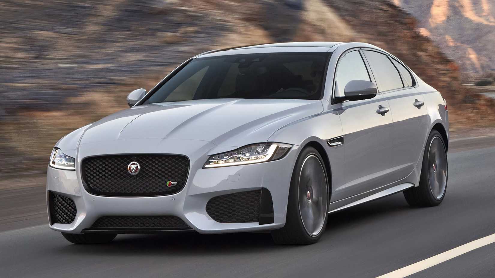 Front 3/4 action shot of a 2019 Jaguar XF S