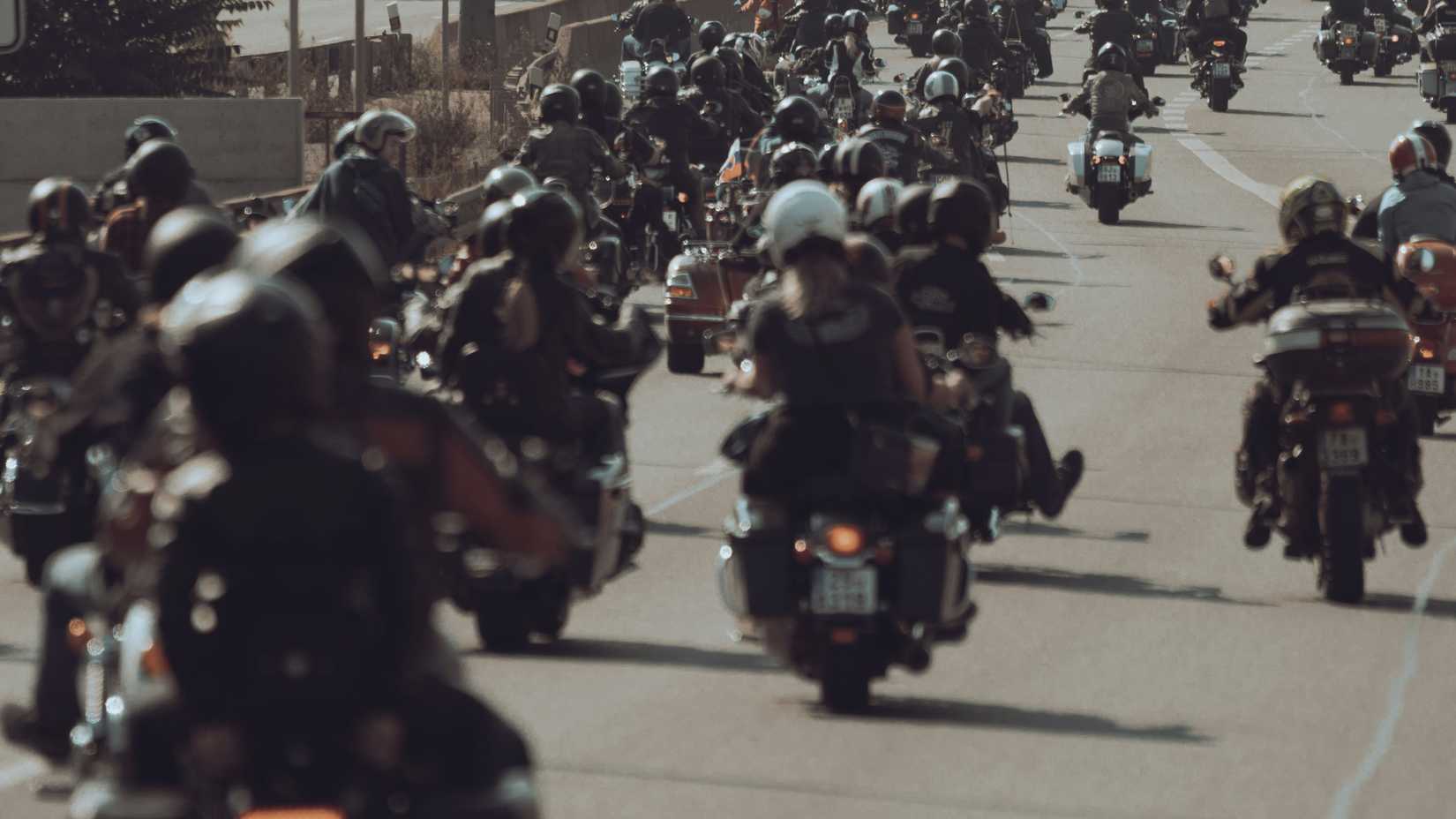 Group of motorcycle riders on highway