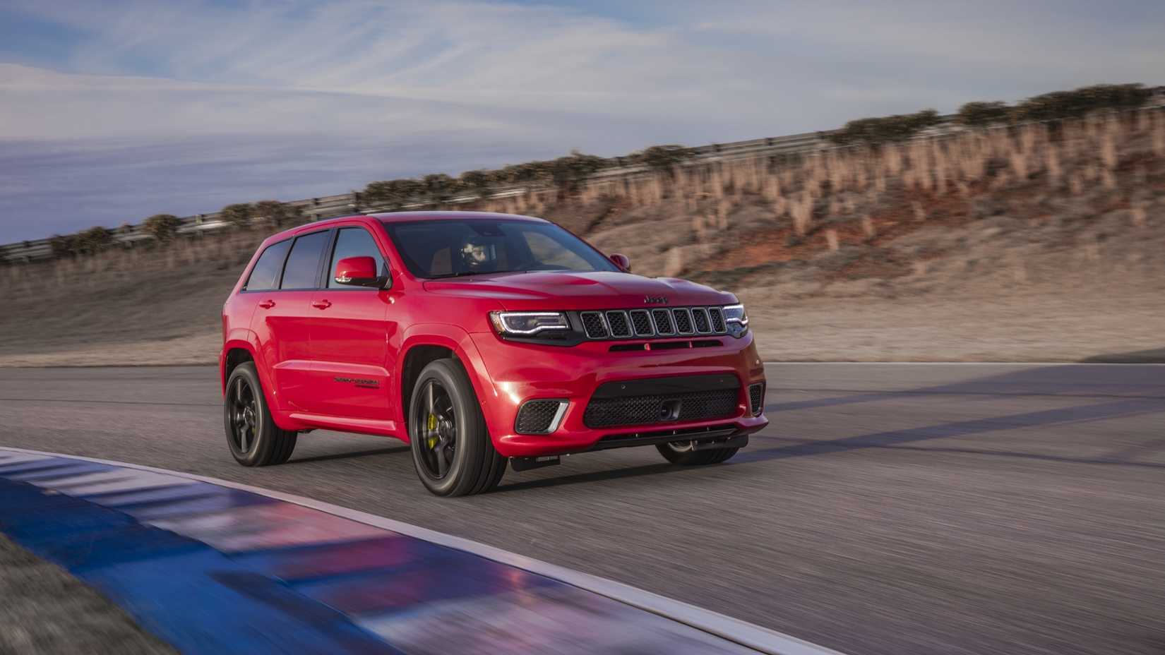 Front 3/4 action shot of the 2018 Jeep Grand Cherokee Trackhawk