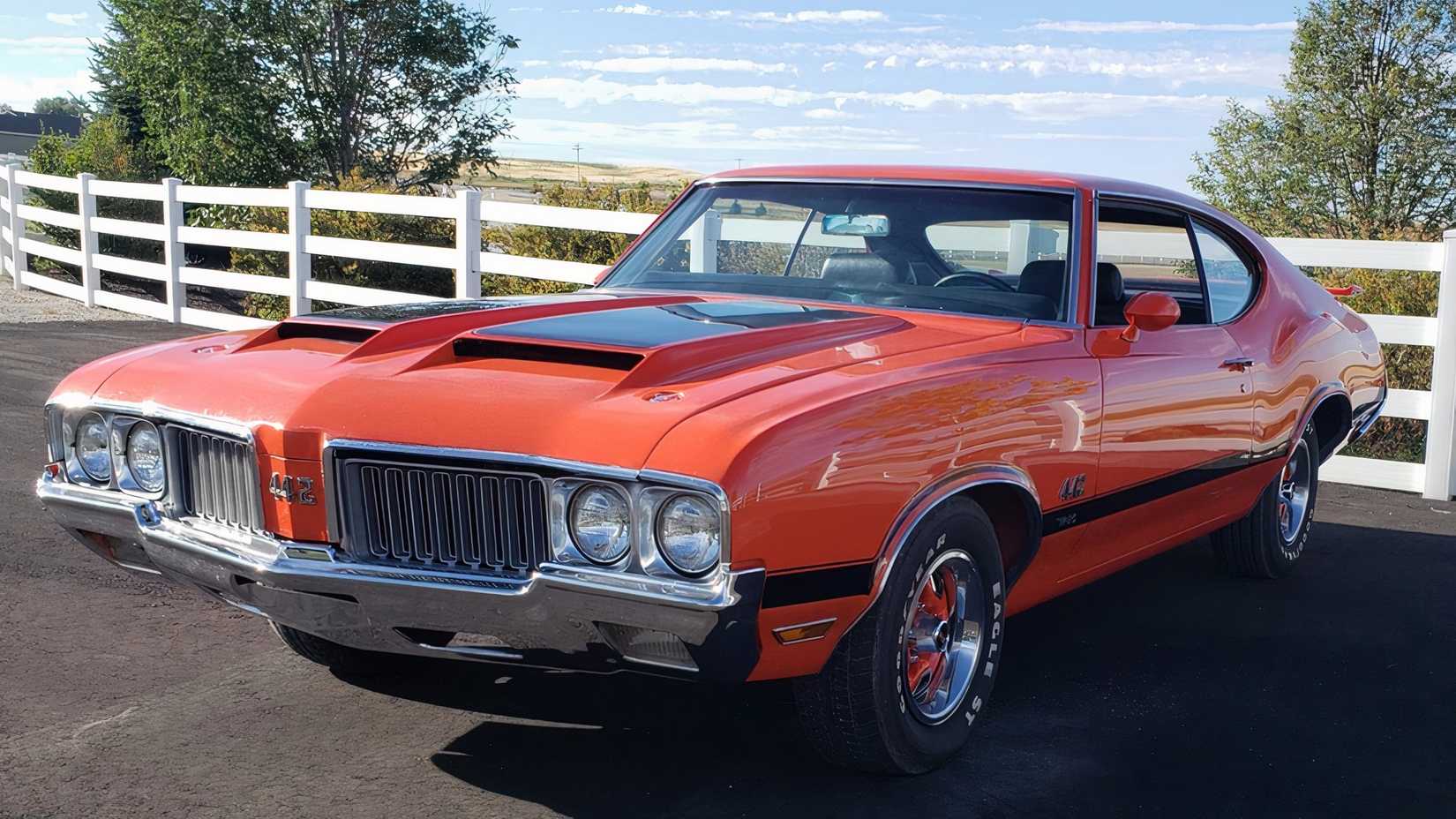 3/4 front view of 1970 Oldsmobile 442 Orange
