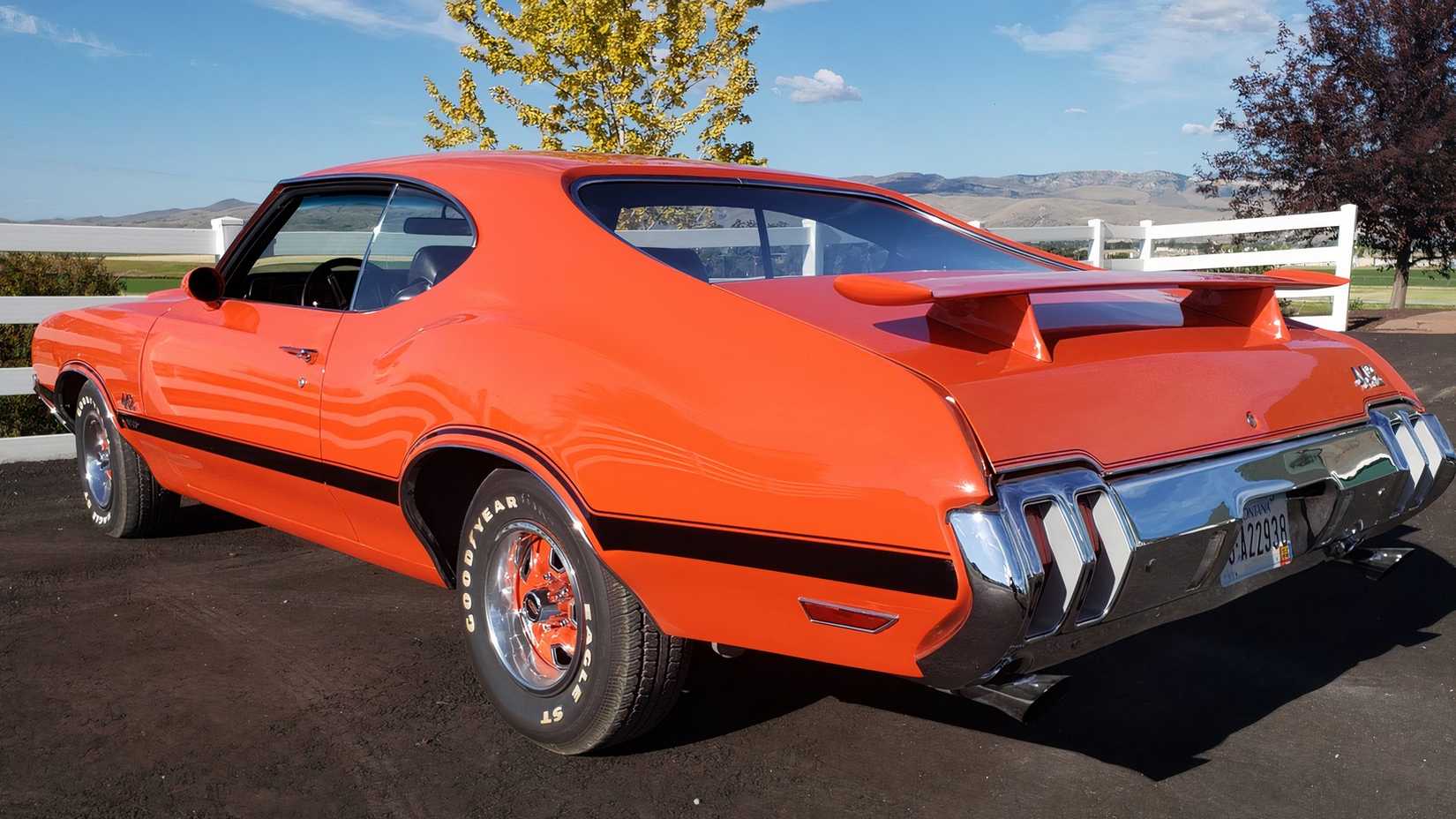 3/4 rear view of 1970 Oldsmobile 442 Orange