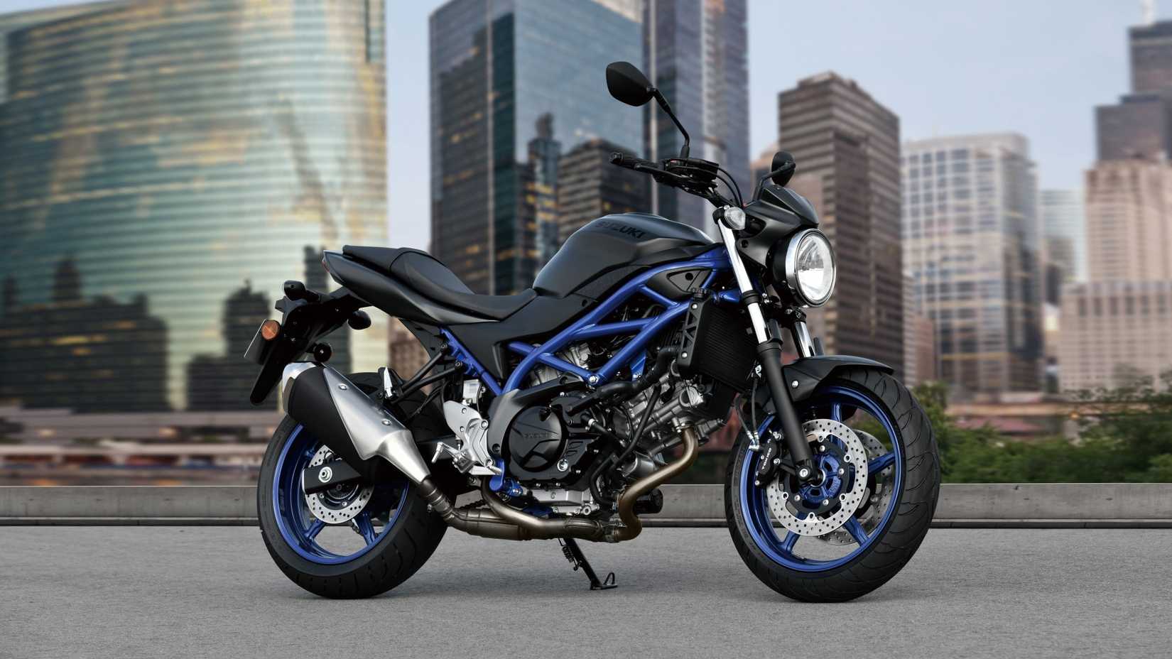 2023 Suzuki SV650 side shot parked in front of city