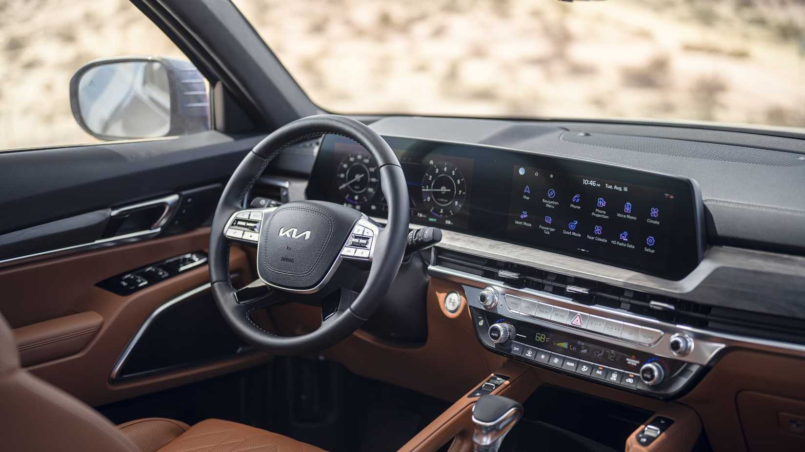 Foto do interior do Kia Telluride 2025 da cabine dianteira mostrando o lado do motorista
