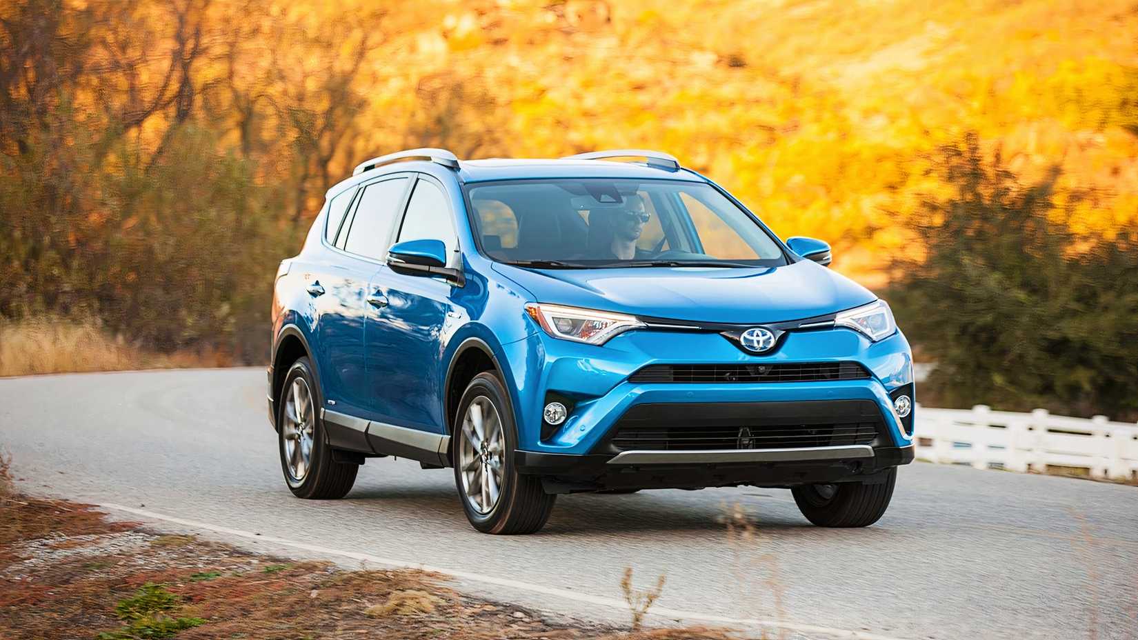 A blue 2017 Toyota RAV4 Hybrid small hybrid SUV.