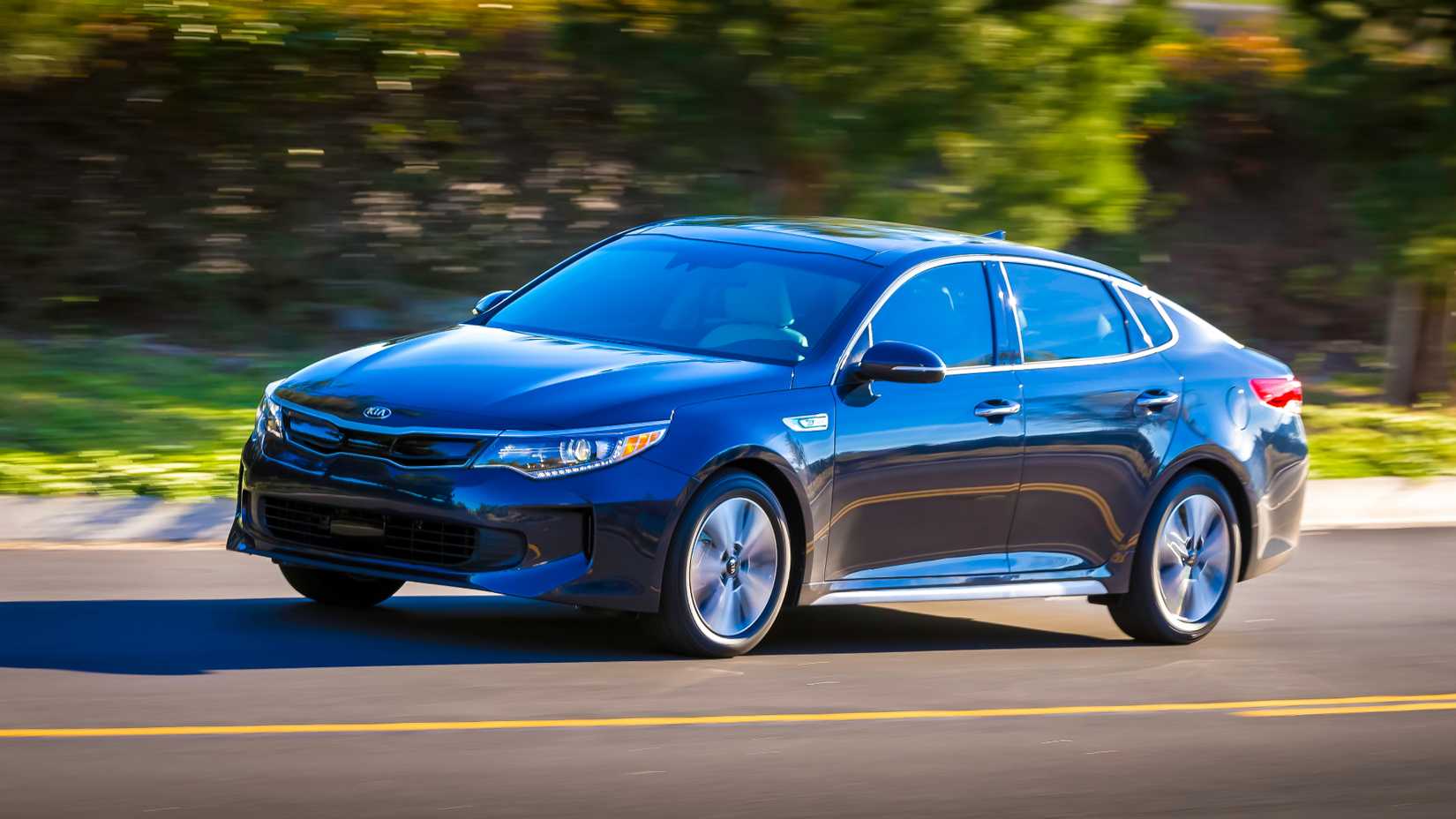 Three-quarter front view of a 2017 black Kia Optima hybrid