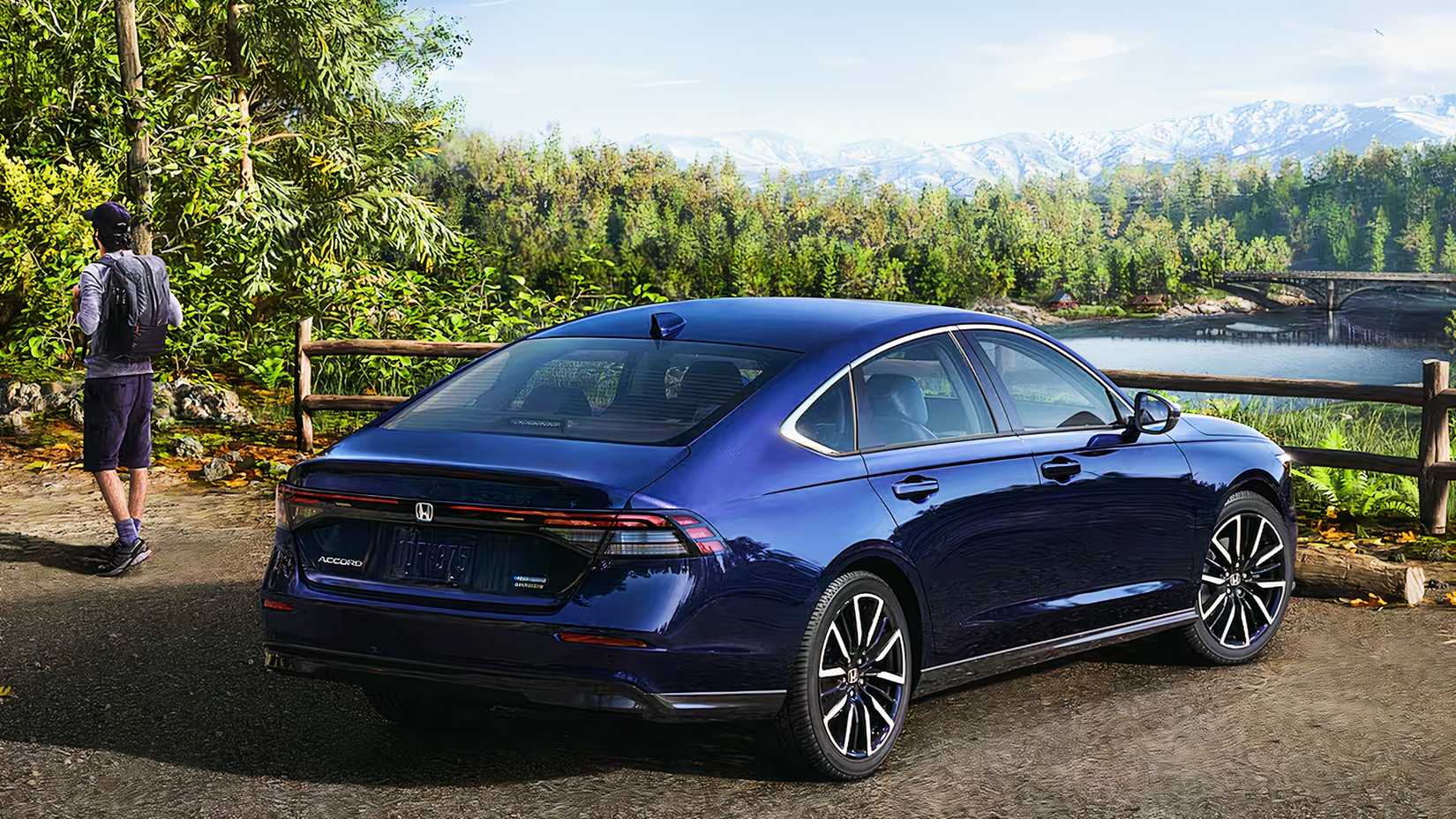 The rear of a blue 2024 Honda Accord Hybrid.