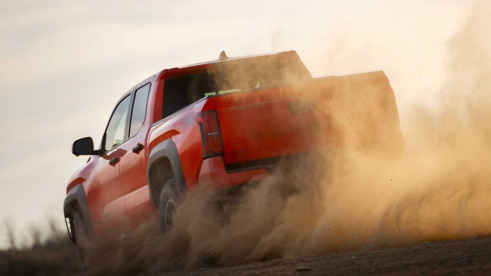 Action shot of the 2024 Toyota Tacoma i-FORCE Max TRD Off-Road