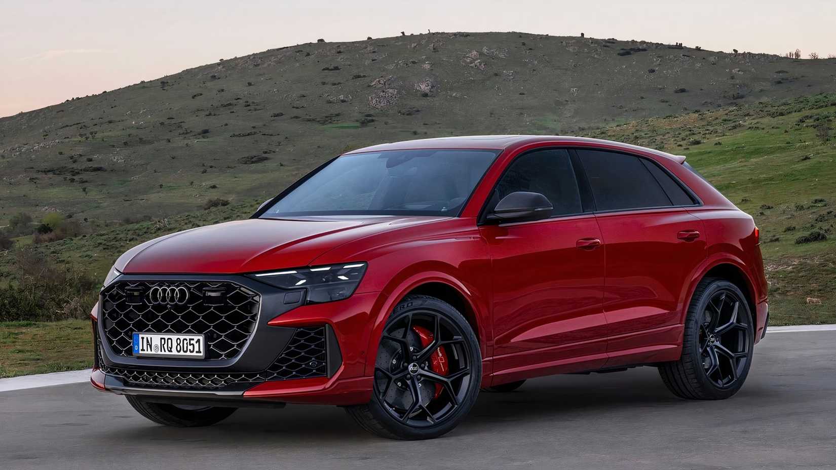 Front three-quarter view of a red Audi RS Q8 performance