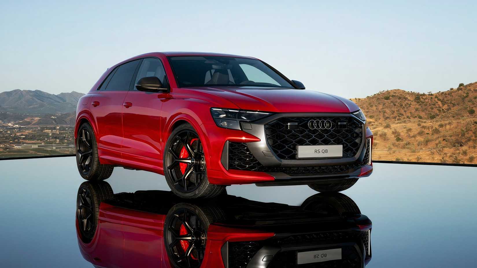 Front three-quarter view of a red Audi RS Q8 performance