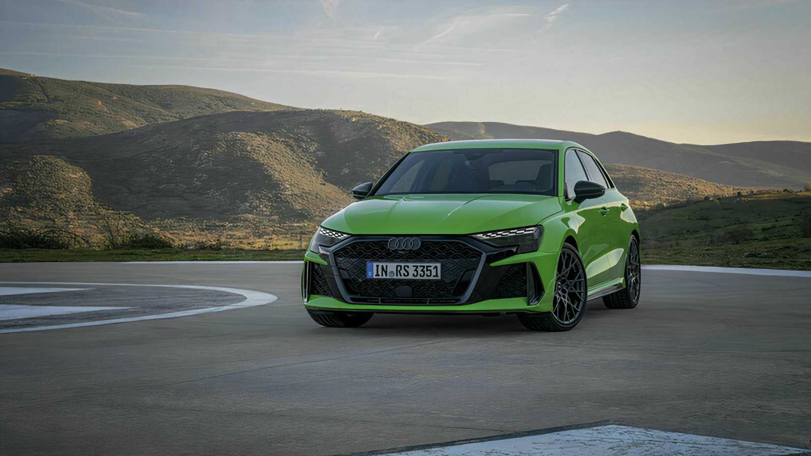 Front three-quarter view of a green Audi RS 3 Sportback