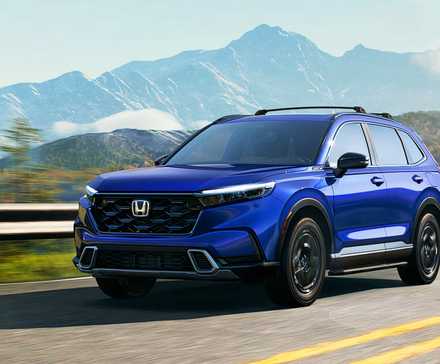 A blue 2025 Honda CR-V Hybrid small hybrid SUV.