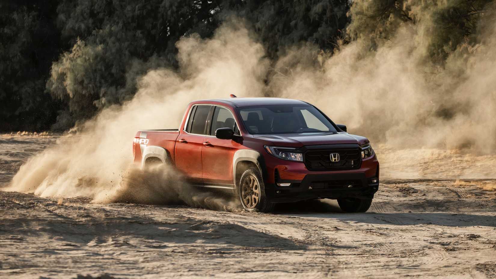 2025 Honda Ridgeline driving through the dirt