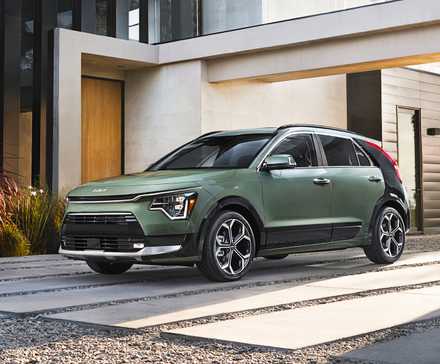 A green 2025 Kia Niro Hybrid subcompact hybrid SUV.