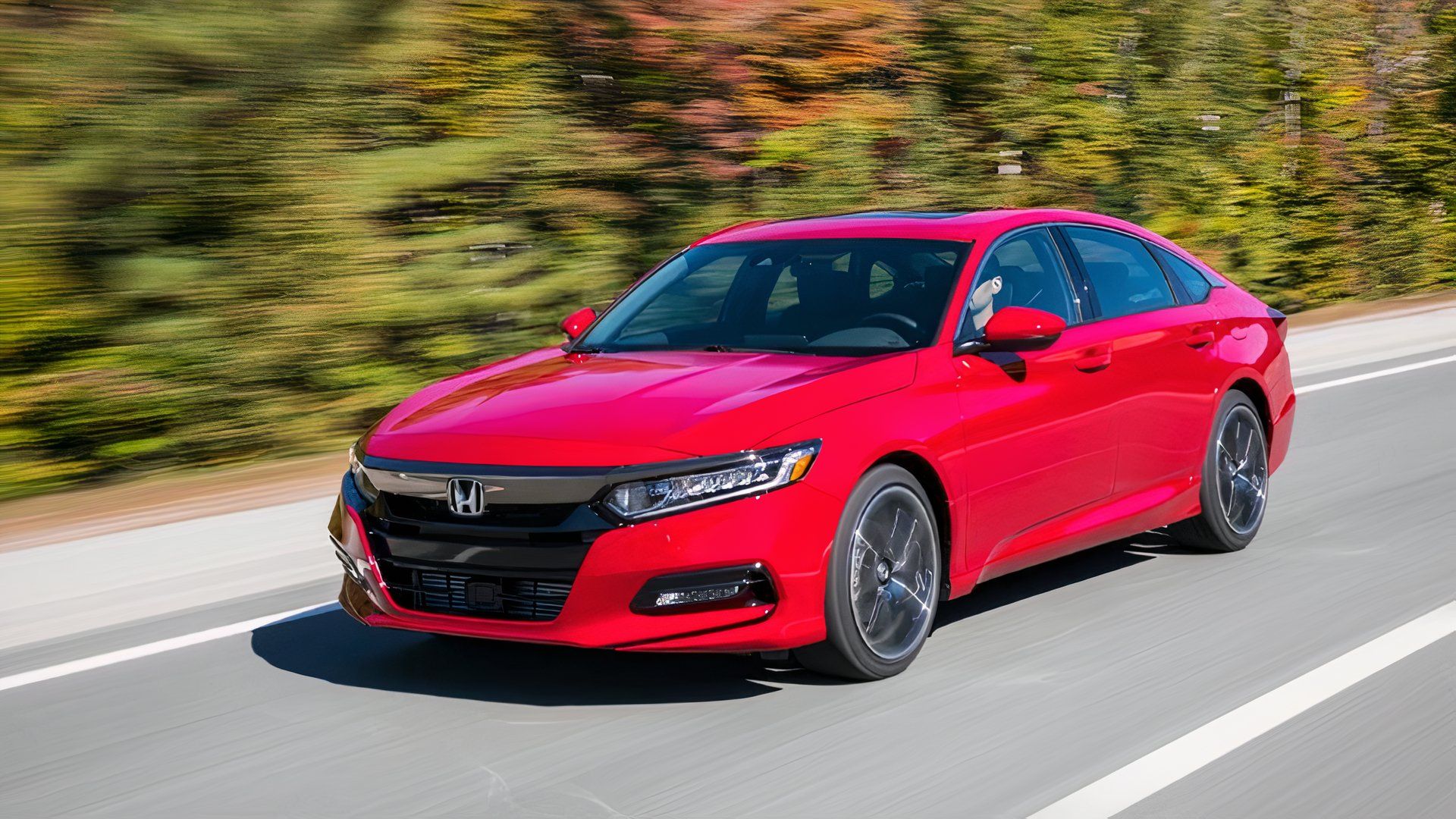 Front 3/4 action shot of a 2020 Honda Accord