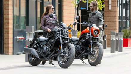 Riders next to a pair of 2025 Honda Rebel 1100 motorcycles