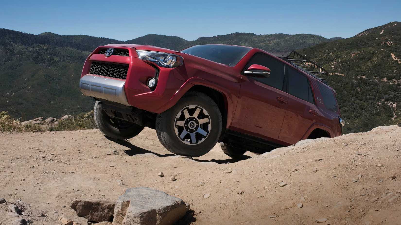 2017 Toyota 4Runner TRD Off-Road in red climbing steep desert hill