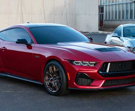 2024 Ford Mustang GT parked next to another Mustang