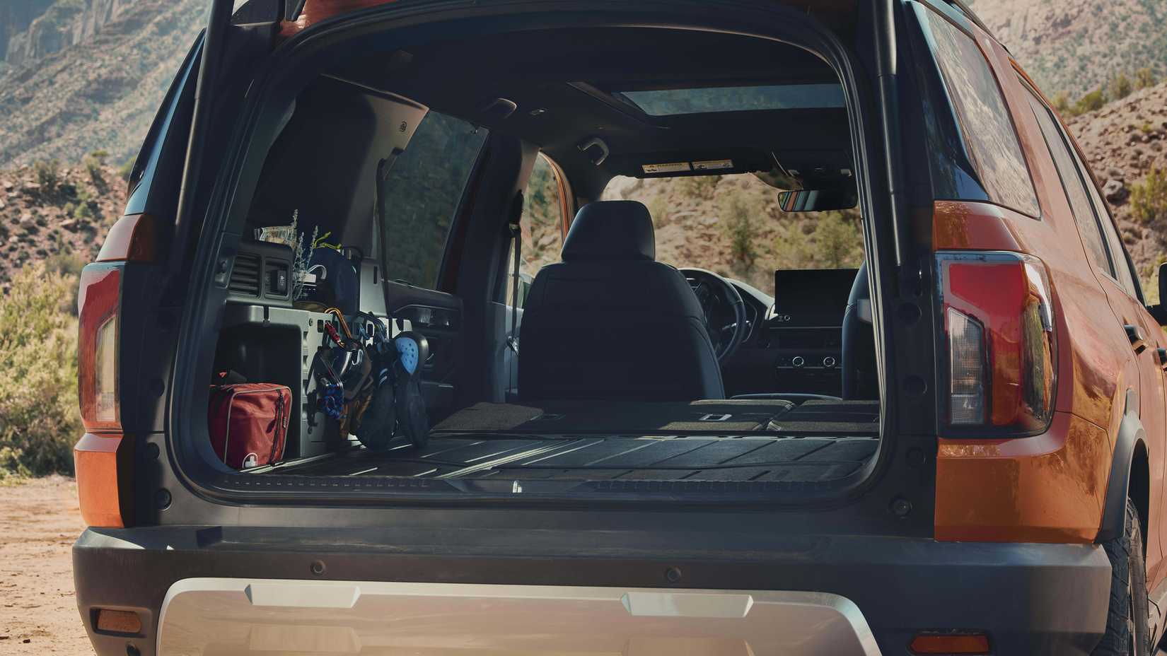 A 2026 Honda Passport shows off its trunk space with its rear hatch open
