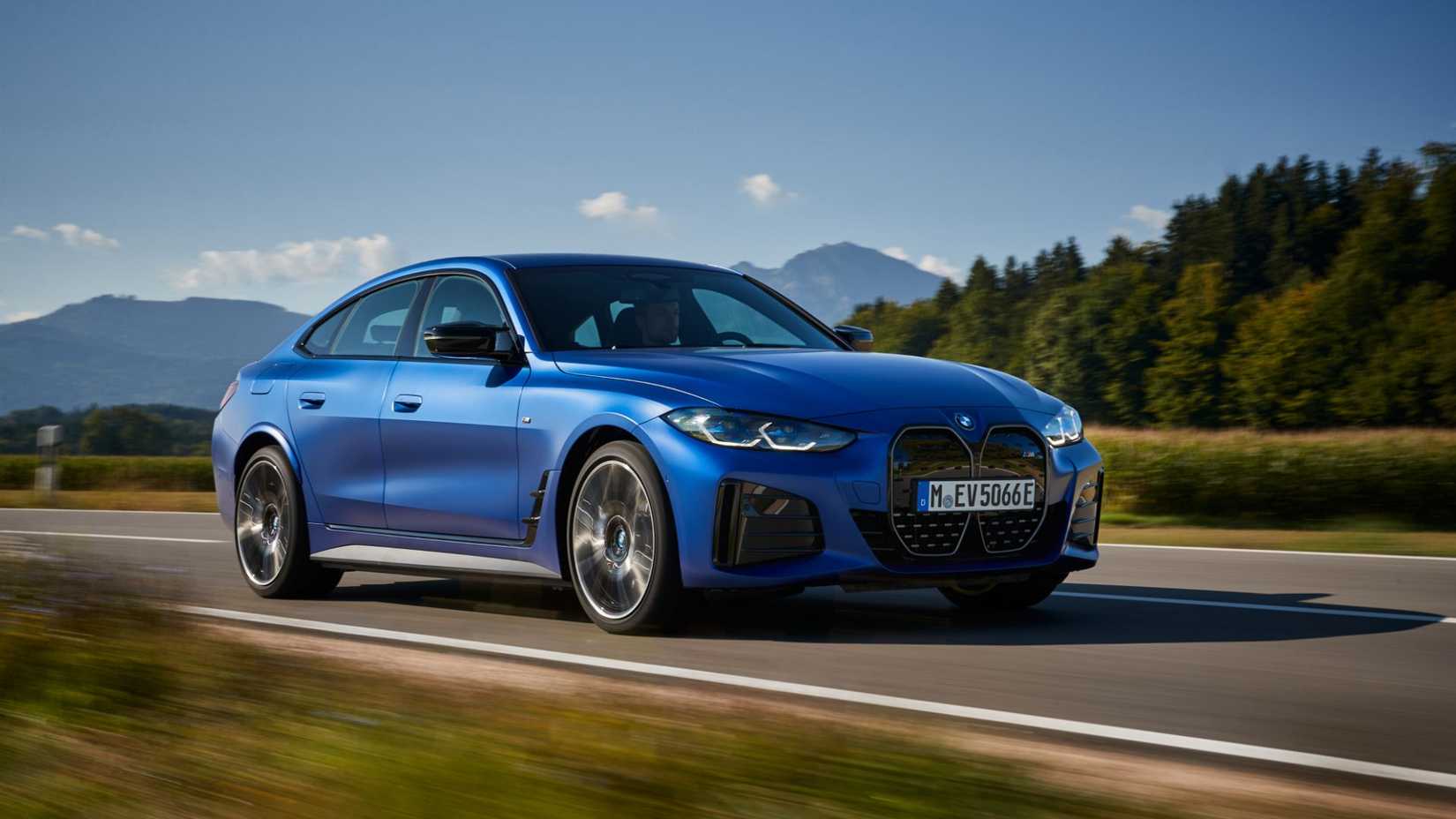 2023 BMW i4 front 3/4 shot driving